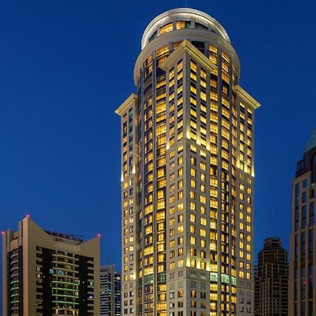 Dusit Hotel & Suites - Doha Dış mekan fotoğraf The hotel at night