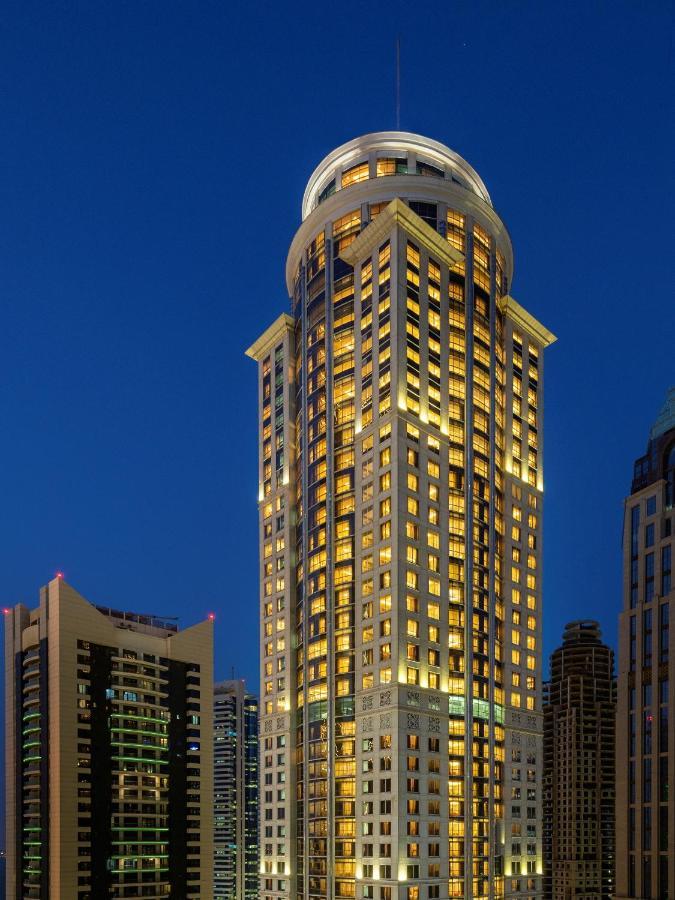 Dusit Hotel & Suites - Doha Dış mekan fotoğraf The hotel at night